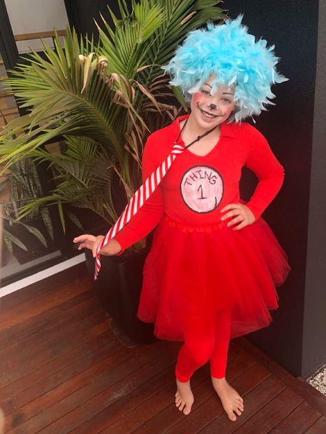 My daughters book week costume as Thing 1.  We did this pretty last minute so lots of the costumes were off the shelf! I just Braided her hair and pinned in a feather boa.  Bought some fabric paint and body paint and made this costume to order! World Book Day Ideas, Book Week Costume, Book Week, Reference Photos, Harajuku, Halloween Costumes, Dress Up, Thing 1, Halloween