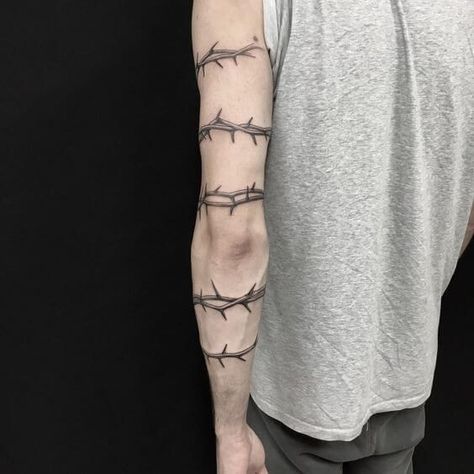 Rose Thorn Tattoo, Thorn Tattoo, Barbed Wire Tattoos, Around Arm Tattoo, Armband Tattoo Design, Rose Thorns, Omerta Tattoo, Skeleton Hand Tattoo, Vine Tattoos