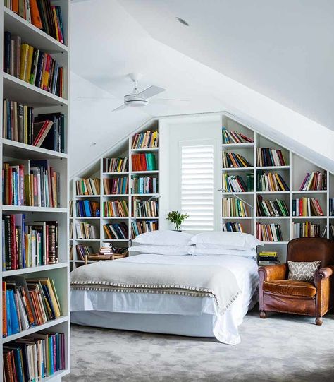 For a book-lover, having your own curated shelf of reads is an absolute must. It's like a mini library you can always visit, and there are endless ways you can style your shelves. Bookish Bedroom, Attic Library, Bedroom Library, Library Bedroom, Small Attic, Attic Remodel, Dekorasi Kamar Tidur, Attic Bedroom, Attic Rooms