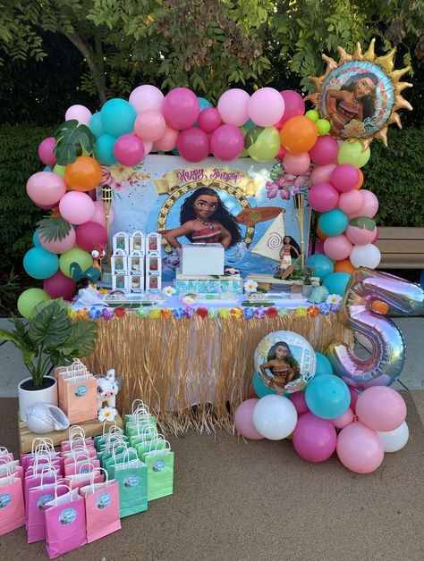 Dakota’s Moana 5th Birthday | CatchMyParty.com Mona Theme Birthday Party, Moana Birthday Party Balloons, Moana Outdoor Party Ideas, Moana Theme Birthday Party Ideas, Moana And Ariel Birthday Party, Moana Themed 2nd Birthday Party, Moana Birthday Balloon Arch, Moana Bday Party Ideas, Moana 5th Birthday Party Ideas