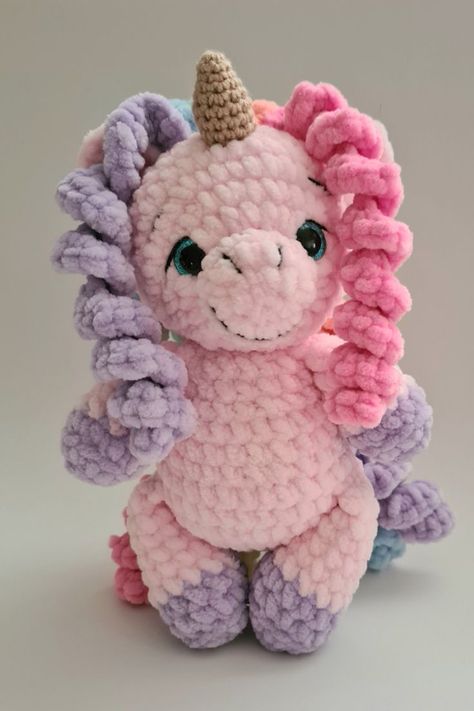 Super soft and cute plush rainbow unicorn amigurumi toy. This adorable unicorn with colorful mane and tale can be a good play mate for your kids during a day time and night. Plushie yarns are so amazing that you will not want to leave it. #plushunicorntoy #crochetunicorntoy #stuffedunicorntoy #amigurumitoys #pinkunicorn #plushtoyanimal #rainbowunicorntoy #colorfulunicorn #giftforgirl #toyfordaughter #birthdaygift #handmade #cutegift #cutetoy #unicornamigurumi Crochet Unicorn Pattern Free, Crochet Unicorn Pattern, Crochet Plushies, Crochet Plush, Crochet Unicorn, Unicorn Pattern, Unicorn Toys, Pink Unicorn, Cute Toys