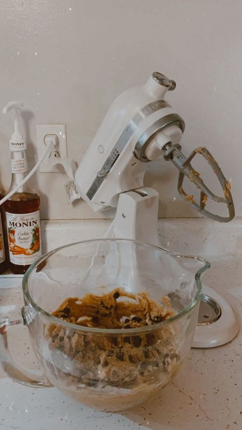 a bowl of cookie dough in front of a  white kitchenaid stand mixer. Counters are white and gold marble with coffee syrups in the back Baking Aesthetic Kitchenaid, Kitchenaid Mixer Aesthetic, Mixer Aesthetic, Baking Chocolate Chip Cookies, Baking Chocolate, Pinterest Contest, Baking Cookies, Kitchen Aid Mixer, No Bake Cookies