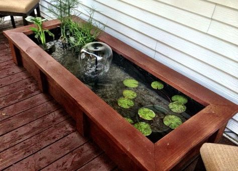 Our deck pond Deck Pond Ideas, Raised Pond, Mini Pond, Container Water Gardens, Patio Pond, Aquaponics Fish, Aquaponics Diy, Diy Pond, Fountains Backyard