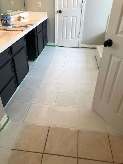 Builder grade to customized glam #DIY #Flooring #Glam Painting Bathroom Floor, Tera Cotta Tile Floor, Kitchen Floor Tile Paint, How To Tile A Floor, Ceramic Tile Paint, Painted Kitchen Floors, Painting Ceramic Tile Floor, Tile Floor Diy, Tile Refinishing