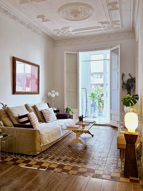 Tour a Wardrobe Stylist’s Stunning Barcelona Apartment | Apartment Therapy Practical Living Room, Barcelona House, Living Room Lighting Ideas, Room Lighting Ideas, Fresh Living Room, Paneled Doors, Patterned Tiles, Barcelona Apartment, Living Room Size