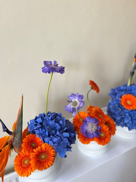 Blue & orange event flowers Blue Tea Party, Sprinkle Decor, Orange And Blue Flowers, Blue Floral Wedding, Event Florals, Baby Favors, Blue Tea, Everlasting Flowers, Flower Bar