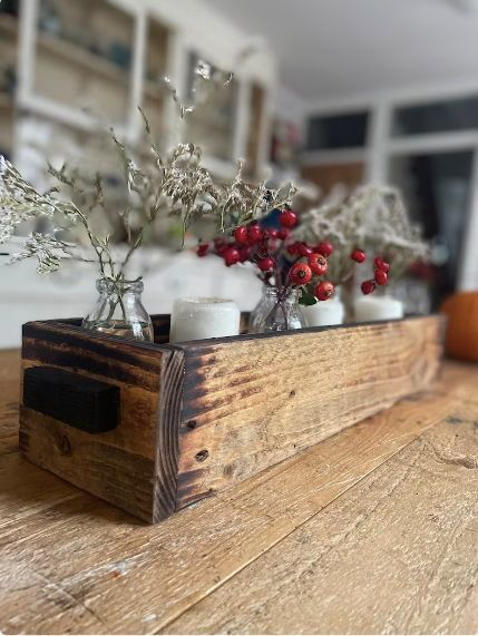 Style your own Christmas table centrepiece box, with the 3 pillar candles included. Simply by adding candles, holly, baubles or pine cones you can create a stunning table centrepiece- and not just for Christmas! Handmade from locally sourced, reclaimed pallet wood and charred on the inside to preserve. Christmas Candle Display, Christmas Table Centrepiece, Wooden Box Centerpiece, Box Centerpiece, Wooden Centerpieces, Rustic Wooden Box, Candle Display, Church Window, Rustic Style Wedding