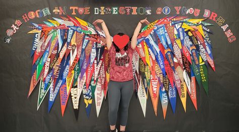 With the saying "Soar High in the Direction of Your Dreams" Academic Advisor Office, One Team One Dream School Theme, College Spotlight Bulletin Board, College Acceptance Bulletin Board Ideas, Cap And Gown Bulletin Board, School Spirit Bulletin Boards High, College Advisor Office Decor, High School Bulletin Boards Hallways, College Pennant Display School Counselor