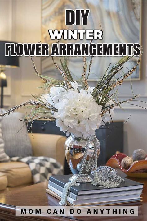 Here are some great ideas for winter flower arrangements that are easy and you can totally do yourself. No need to be a florist! How to put it all together. #momcandoanything #diyflowers #diyflowerarranging #diyfloraldesign #howtoflowers #flowerarrangements #howtoarrangeflowers #arrangingflowers #winterflowerarrangements #winterfloral #winterfloralideas #winterflowerideas #flowerinspo #flowerinspirations #winterflowers January Arrangements, Winter Floral Arrangements Tall Vase, Diy Winter Floral Arrangements, January Floral Arrangements For Church, January Flower Arrangements For Church, Winter Flower Arrangements For Church, Winter Fake Flower Arrangements, Winter Floral Arrangements For Church, Winter Arrangements Indoor