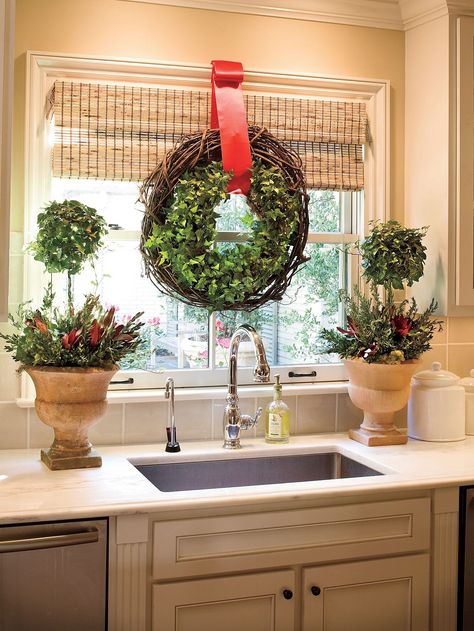 50+ Christmas Wreath Ideas for Windows, Doors, and More Wreath On Window, Kitchen Window Wreath, Christmas Wreaths For Windows, Wreath Kitchen, Christmas Wreath Ideas, Kitchen Wreath, Window Wreath, Christmas Windows, Doors Ideas