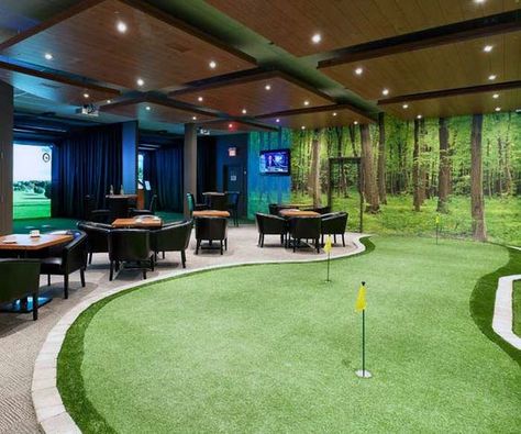 Cool Indoor Putting Green Mens Game Room Designs Golf Basement Man Cave, Golf Indoor Simulator, Indoor Golf Simulator Man Cave, Golf Simulator Business, Entertainment Area Ideas Indoor, Golf Simulator Room Man Caves, Basement Sports Bar Ideas, Indoor Golf Room, Golf Simulator Bar