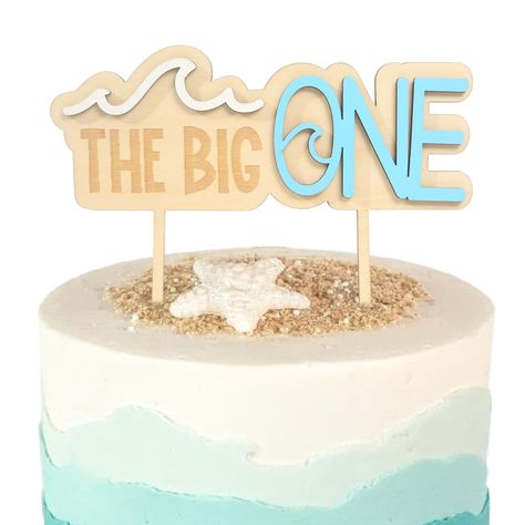 PRICES MAY VARY. 🏄🏻‍♂️An Ocean of Fun: Our cake topper brings the spirit of surf and sand right to your party! With wave, and 'number one' elements, it doubles as the perfect centerpiece for your 1st birthday cake. 🏄🏻‍♂️Capture the Surf Vibes: Enhance your beach-themed birthday party with our 'Big One' Cake Topper. Its vibrant color palette and surfing motif bring an extra splash of surf to your little surfer's special day. 🏄🏻‍♂️Multipurpose Party Piece: This isn't just a cake topper; it's The Big One First Birthday Cake, First Wave Birthday Cake, The Big One Surf Birthday Cake, Surf Smash Cake, First Wave Birthday Party, The Big One Birthday Cake, Surf Cake Smash, The Big One Cake Topper, The Big One Surf Birthday Cake Topper