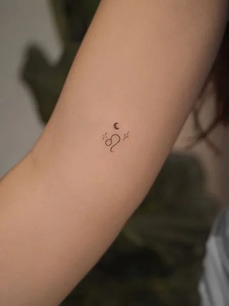 Leo And Moon Tattoo, Leo Star Sign Tattoo Ideas, Leo Tattoo On Wrist, Leo Sun Sign Tattoo, Leo Tattoo Hand, Leo Tattoo Simple, Leo Symbol Tattoo Zodiac, Minimal Leo Tattoo, Leo Finger Tattoos For Women