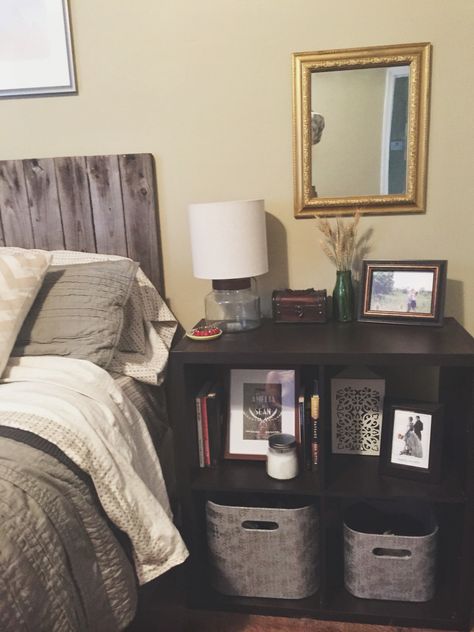 Cubes as a nightstand for extra storage. Spray painted Dollar Tree mirror. #nightstand #bedroom #storage #newlywed #mirror #gold #gray Ikea Cubes, Storage Hacks Bedroom, Cube Storage Shelves, Cube Shelves, Nightstand Storage, Night Stands, Night Stand, Cube Storage, Organization Bedroom