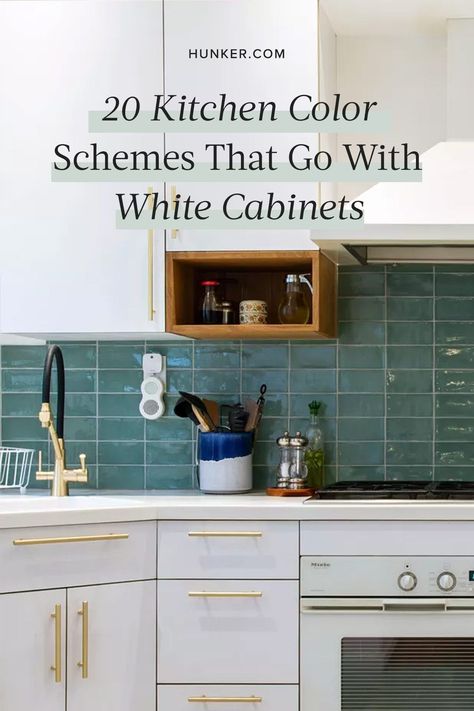 Whether you are thinking of installing white cabinets in your kitchen or you're looking to freshen up your existing cook space, selecting accent colors can be somewhat daunting. #hunkerhome #kitchen #kitchencolor #kitchencolorscheme Colourful Kitchen White Cabinets, White Cabinets Color Backsplash, White Kitchen With Pop Of Color, White Kitchen Cabinets Color Backsplash, Kitchen White Cabinets Colored Walls, Kitchen Cabinet Color Ideas With White Tile Floors, White Cabinets Colored Walls, White Kitchen With Accent Color, Small Kitchen Colours Ideas