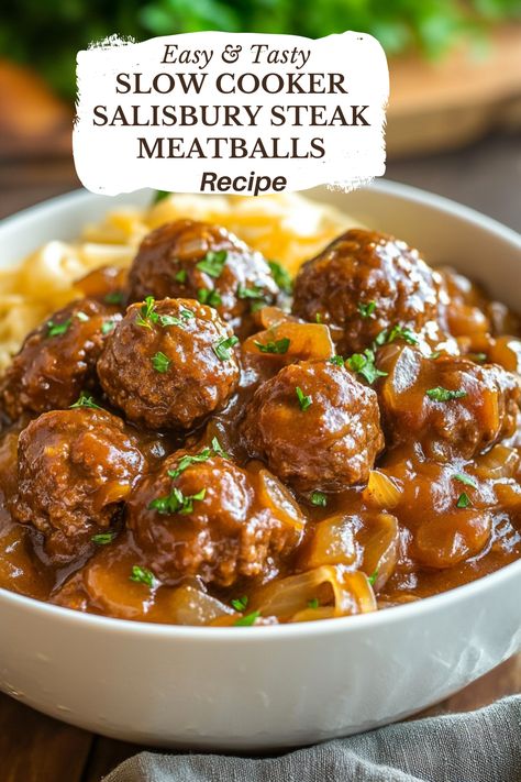 Effortlessly prepare these Slow Cooker Salisbury Steak Meatballs for a comforting dinner. This simple recipe uses frozen meatballs, making it incredibly easy to set up. Just add seasoning packets and beef broth into your slow cooker, and let it do the magic. As it cooks, it develops a rich, savory gravy—ideal over a bed of Slow Cooker Meatball Pot Roast, Frozen Meatball Salisbury Steak, Frozen Beef Meatball Recipes, Crock Pot Salisbury Steak Meatballs, Slow Cooker Salisbury Steak Meatballs, Crockpot Salisbury Steak Meatballs, Salisbury Meatballs Crockpot, Salisbury Steak Meatballs Crockpot, Meatball Crockpot Recipes