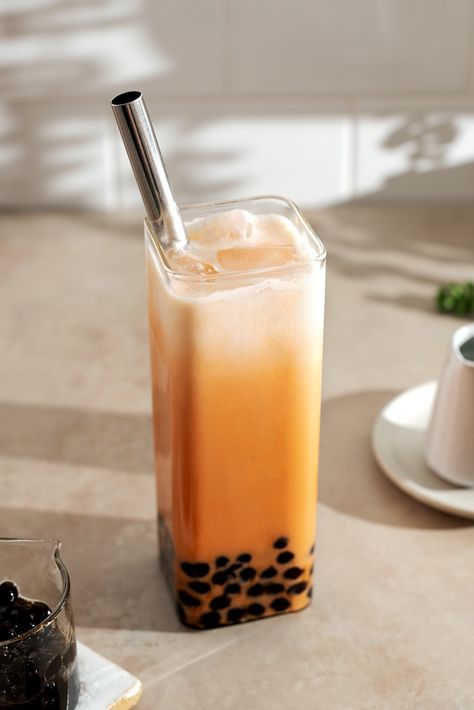 This thai milk tea boba drink is sweet and refreshing. It's made with the unique taste of classic thai tea and chewy tapioca pearls. #boba #thaitea #bubbletea | teakandthyme.com Thai Milk Tea Boba, Thai Tea Boba, Tapioca Boba, Milk Tea Boba, Bubble Tea Flavors, Thai Milk Tea, Make Brown Sugar, Boba Pearls, Bubble Tea Shop