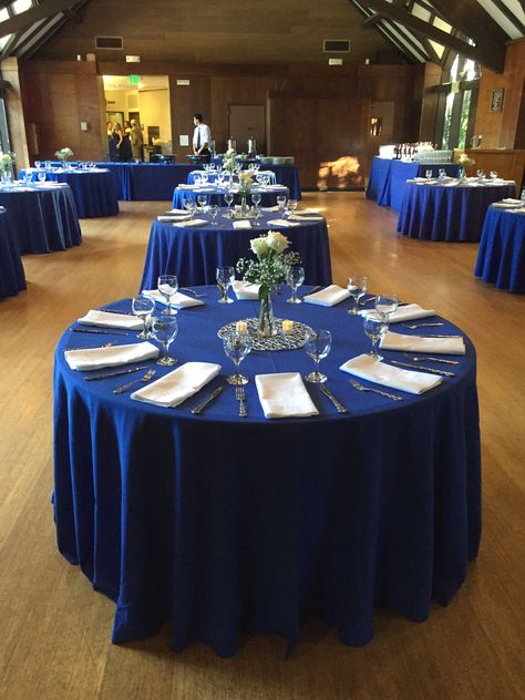 Royal Blue Round Table, Midnight Blue Table Cloth, Royal Blue Tablecloth, Red And Navy Blue Wedding Centerpieces, Navy Chair Covers Wedding, Royal Blue Tablescape, Royal Blue And White Decorations Party, Midnight Blue Table Setting, Royal Blue And Silver Table Settings