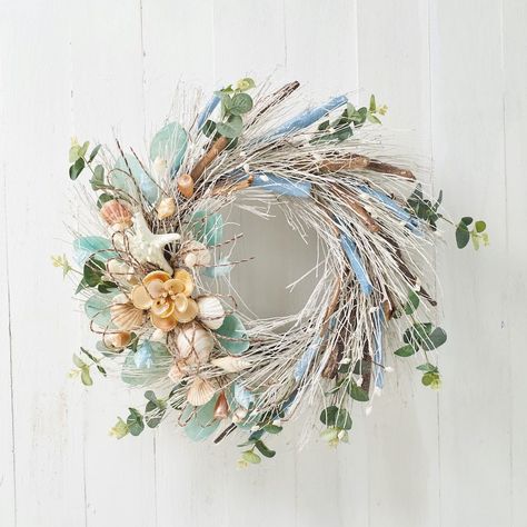 PRICES MAY VARY. [ Premium Coastal Elegance: ] Elevate your living spaces with a touch of coastal luxury. Our driftwood and capiz shell wreath exudes the essence of premium summer decor, infusing your home with a soothing coastal vibe. [ Handcrafted Artistry: ] Each wreath is a work of art, meticulously handcrafted by skilled artisans. The attention to detail ensures a stunning and unique masterpiece that adds elegance to any space. [ Nature's Finest Elements: ] Embrace the beauty of the ocean w Wall Staircase, Shell Wreaths, Shell Garland, Coastal Wreath, Shell Wreath, Dog Kisses, Beach Wreath, Capiz Shell, Elegant Fall