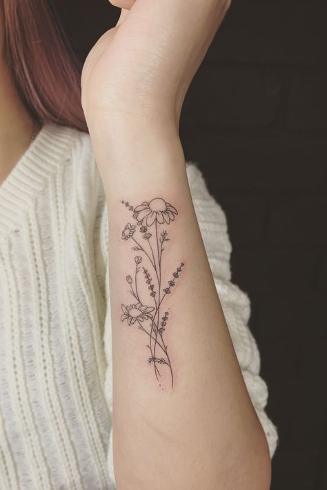 Wrist Bouquet Tattoo, Bouquet Wrist Tattoo, Flower Tattoo On Bicep, Little Dainty Tattoos, Wildflower Wrist Tattoo, Chamomile Tattoo, Small Floral Tattoo, Tattoo Lavender, Between Breast Tattoo