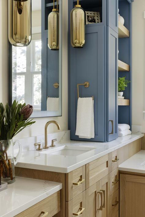 This stunning bathroom renovation is all about combining natural elements with a modern touch. The mix of warm oak cabinetry and calming blue tones creates a serene and stylish sanctuary. With brass accents adding a touch of luxury.
From the beautiful herringbone tile in the shower to the cozy nook for a relaxing soak #BathroomReno #InteriorDesign #HomeInspo #CustomHomes #Renovation #DesignDetails #BathroomGoals #StyleAndStructure #NeverTheSameHomeTwice #ModernHome #DesignInspo Stunning Bathrooms, Herringbone Tile, Bathroom Goals, Bathroom Renos, Cozy Nook, Brass Accents, Natural Elements, Blue Tones, Bathroom Renovation