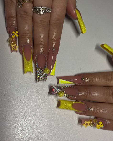 Yellow freestyle💛🌼✨ . . . Dm to book!💖 @nailed.byjennie #longnails #yellownails #blingnails #glitternails #frenchnails #nailsofinstagram #nailsoftheday #fresnonails #fresnonailtech #explorepage Y2k Nails Yellow, Yellow Junk Nails, Yellow Long Acrylic Nails, Yellow And Gold Nails Design, Black And Yellow Nails, Yellow Acrylic Nails, Acrylic Nails Yellow, Lemon Nails, Junk Nails