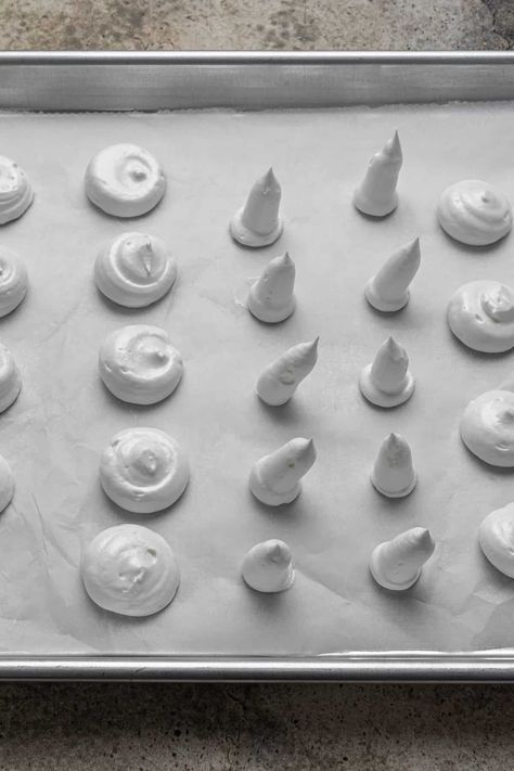 piping the mushroom stems and caps on parchment paper Frosting Mushrooms, Mushroom Meringue, Merengue Mushrooms, Meringue Mushrooms Easy, Meringue Mushrooms, Traditional French Desserts, Christmas Yule Log, Chocolate Melting Wafers, Mushroom Powder