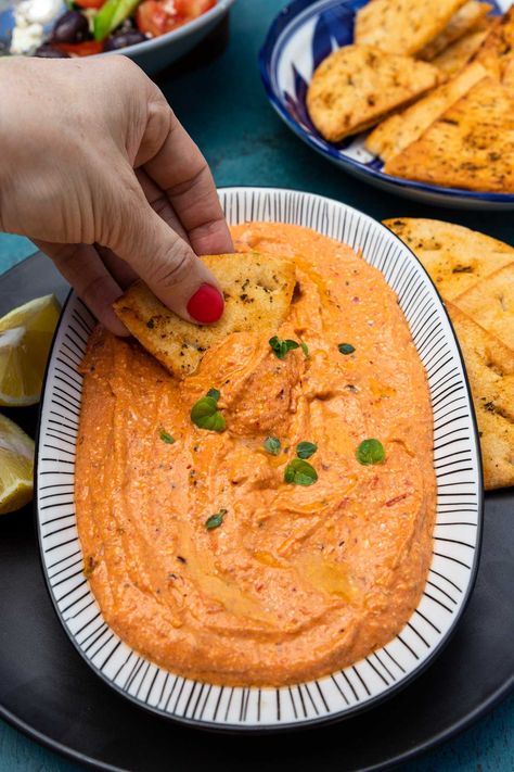 Your new favorite cold dip. Tyrokafteri is a tangy, salty, zesty and delicious 5-minute 5-ingredient Greek spicy feta dip. Perfect for mezze platters, appetizers & more! Fire Feta Recipe, Greece Themed Party, Spicy Feta Dip, Greek Appetizer, Spicy Feta, Greek Appetizers, Greek Dinners, Spicy Dip, Feta Recipes