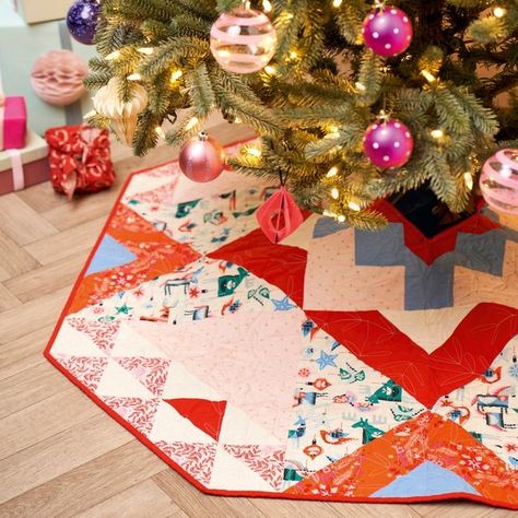 Art Gallery Fabrics® on Instagram: "Can you tell that we’re excited for the Holidays?🎄 And we’re even more excited than ever, with the latest issue of @lovequiltingmag. Swipe left to see Pat Bravo on the cover 👏 and lots of yummy holiday goodness including this adorable Christmas tree skirt featuring Christmas in the City collection and a modern holiday quilt featuring PURE Solids, so get your copy now!⁠ ⁠ #lovequiltingmag #artgalleryfabrics #quiltyproject #quilting #quilt #patchwork #patbravo Christmas Tree Skirt Pattern, Christmas Tree Skirts Patterns, Tree Skirt Pattern, Quilt Magazine, Pattern Sewing, Patchwork Quilting, Christmas Sewing, Santa Baby, Tree Skirt