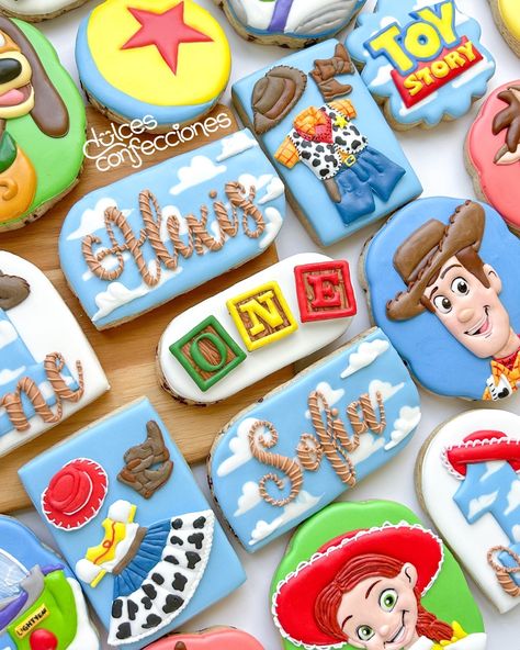 Loved making these Toy Story cookies for some adorable twins' first birthday! #decoratedcookies #sugarcookies #sugarcookiesofinstagram #customcookies #edibleart #sugarartist #cookieart #toystorycookies First Toy Story Birthday, Toy Story Cookies 2nd Birthday, Toy Story Cookies Decorated, Toy Story First Birthday, Toy Story Cookies, First Birthday Cookies, Toy Story Baby, Animal Cookie, Disney Cookies