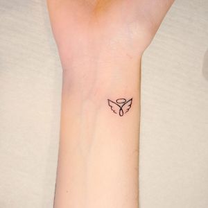 Small Tattoos For Women On Hand, Angel Small Tattoo For Women, Minimal Tattoo For Women Simple, Angel Wings Tattoo Outline, Tiny Angel Tattoos For Women, Simplistic Angel Tattoo, Angel Minimal Tattoo, Small Tattoo Ideas Angel, Simple Angel Tattoo For Women