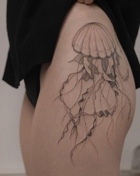 Discover the art of transformation with jellyfish tattoos in our article. Explore it and find 50+ stylish designs with meanings explained. Jellyfish Tattoo Design, Leg Tattoo Designs, Cute Thigh Tattoos, Jellyfish Tattoo, Hip Tattoos Women, Stylist Tattoos, Thigh Tattoos Women, Large Tattoos, Leg Tattoo