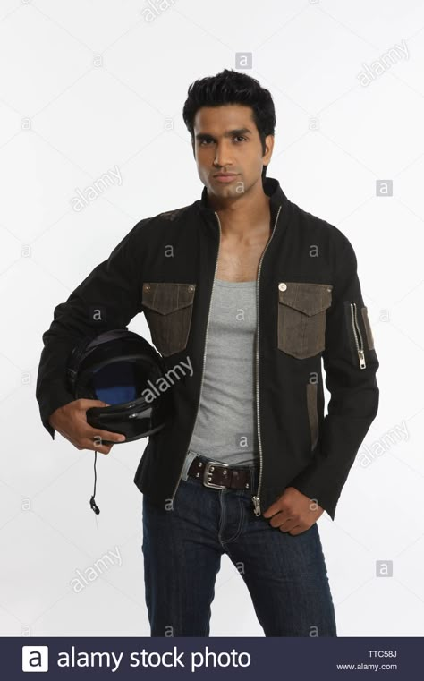 Biker holding a helmet under the arm ... Holding Motorcycle Helmet Reference, Biker Helmet Reference, Holding A Helmet Reference, Taking Off Helmet Pose Reference, Holding Helmet Pose Drawing, Person Holding Helmet Reference, Racer Pose Reference, Biker Pose Reference, Helmet Pose Reference