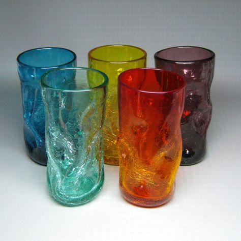 OKAY EVERYONE these are the glasses i have been looking high and low for, please help me find them! Pinch - Crackle Glass Tumblers. Blenko Glass - Milton, WV Antique Dinnerware, Colored Bottles, Colorful Dinnerware, Retro Dishes, Vintage Drinking Glasses, Blenko Glass, Colored Glassware, Viking Glass, Glass Tumblers