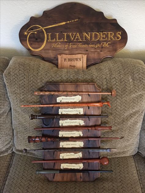 Harry Potter wand display I made for my dad. He makes the wands to spec by hand out of hardwood. Harry Potter Wand Display, Nursery Harry Potter, Harry Potter Weihnachten, Wand Display, Classe Harry Potter, Cumpleaños Harry Potter, Stile Harry Potter, Harry Potter Bday, Harry Potter Room Decor