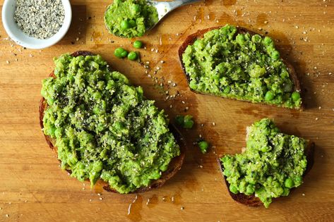 BOSH! Peas On Toast. Who doesn't love things on toast? This amazing recipe has smashed peas on toasted sourdough, flavoured with miso, green chilli and lime. As bouji breakfasts go, this one is an absolute triumph. Smashed Peas On Toast, Peas On Toast, Pea Mash, Smashed Peas, Love Things, On Toast, Green Chilli, Green Peas, Health Eating