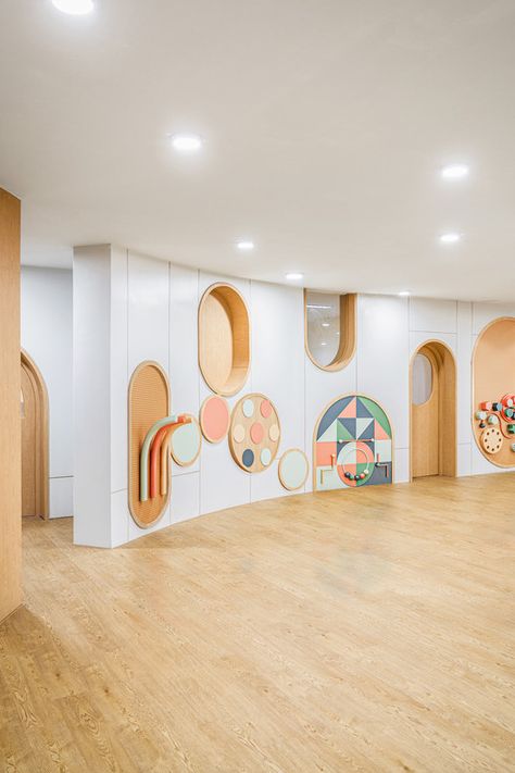 KPIS Kindergarten / Please Feel Invited | ArchDaily Wall / Partition / Cabinet / Fun / Play Wall Education Design Interior, Kindergarten Interior, Preschool Designs, Daycare Design, Kids Cafe, Kindergarten Design, School Interior, Clinic Design, Education Design