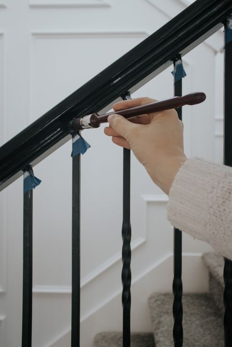 Staircase Makeover Reveal – With Love, Mercedes Paint Metal Stair Railing, Black Bannisters And Spindles, Painting Stair Banisters, Redo Banister Diy, Best Black Paint Color For Banister, Banister Paint Ideas, Painting Railings Banisters, Painting Bannister, Painting Banisters Railings