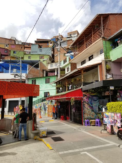 Medellin Columbia-Comuna 13. An former drug/gang controlled barrio turned inspirational neighborhood with a positve influence that all poor neighborhoods in the world could learn from. Graffiti artwork is truly amazing. Poor Neighborhood Aesthetic, Sinbad Aesthetic, Poor Neighborhood, Thanksgiving Jokes, Trip To Colombia, Adventure Landscape, Graffiti Artwork, Retro Images, Top Travel Destinations