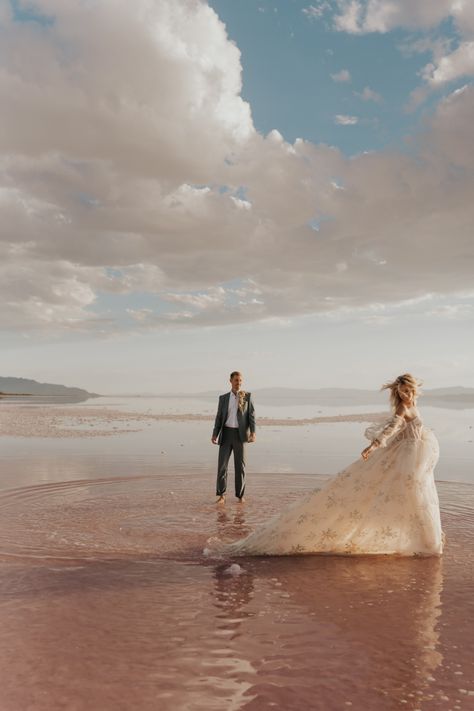 Wedding attire inspo + utah pink lake + groom lapel florals + floral wedding dress + pearl wedding dress + candid photos Pink Lake Utah Photoshoot, Wedding Dress Pearl, Kansas Wedding, Lake Photoshoot, Pearl Wedding Dress, Blush Wedding Dress, Bonneville Salt Flats, Pink Lake, Lake Photos