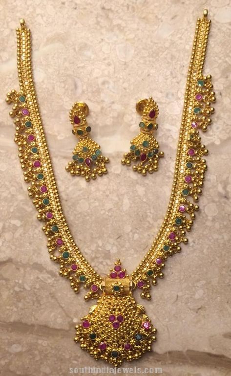 22K Gold Kundla mala set with matching earrings. The necklace is studded with precious pink and green stones. Muvvala Haram Designs Gold, Muvvala Haram, Gundla Mala, Mini Haram, Borax Cleaning, Mango Haram, Haram Designs, Roti Recipe, Gold Bridal Necklace