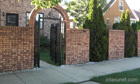 privacy fencing with brick and iron | fences brick fence with iron previous fence designs next Brick Fence Design, Brick And Wood Fence, Brick Fence Ideas, Imprinted Concrete Driveway, Brick House Exterior Makeover, Best Exterior House Paint, Fence And Gate, Privacy Fencing, Iron Fences