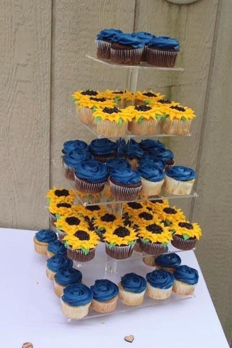 Sunflower Wedding Navy Blue, Navy Blue Roses And Sunflower Wedding, Red Blue And Sunflower Wedding, Wedding Ideas Yellow And Blue, Royal Blue And Sunflower Wedding Decor, Sunflower And Blue Centerpieces, Navy And Sunflower Wedding Decorations, Navy Blue And Sunflower Wedding Cake, Sunflower And Blue Wedding Cake