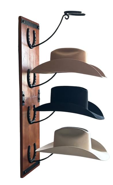 PRICES MAY VARY. Cowboy Hat Holder: The cowboy hat holder for wall is a meticulously crafted hat rack designed for showcasing cowboy hats in style. With distinctive design features, the cowboy hat wall mount comes with handmade metal horseshoe mounts that suspend hats upright, offering a unique and eye-catching display solution. Premium Built: Crafted from high-quality wood and metal, the cowboy hat rack hanger ensures longevity and resilience. The sturdy build of hat rack display provides a rel Welding Projects Hat Rack, Western Home Decor Ranch Style Dining Room, Metal Art Gifts, Cute Country Home Decor, Western Blanket Holder, Wall Of Hats, Western Men Gifts, Horseshoe Wall Decor, Vintage Cowboy Decor