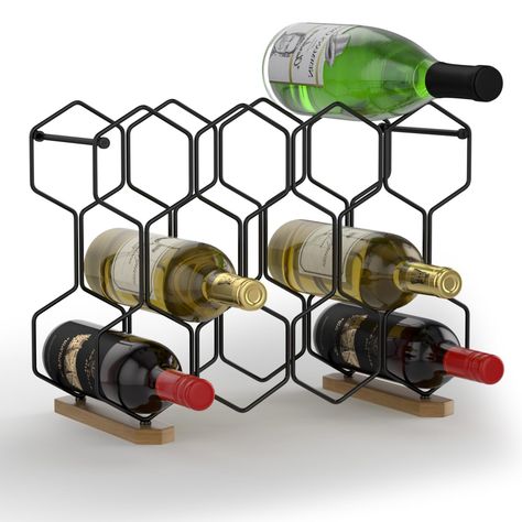 Ample Bottle Capacity: Maximize your wine storage with our modern countertop wine rack, featuring 11 slots for standard wine bottles and an additional 3 slots on top for larger bottles such as Champagne. With a diameter limit of 3.6", it accommodates all your 750ML standard wine bottles, providing space for up to 14 bottles Unparalleled Durability: Crafted from high-quality wrought iron and wood materials with a plating finish, our tabletop wine rack is built to last. Say goodbye to bending, scratches, or fading common with traditional paint finishes. This wine bottle holder is exceptionally sturdy, ensuring it won't wobble, tilt, or fall, providing a reliable and long-lasting storage solution Stylish Modern Design: Elevate your wine display with our modern wine rack. Its distinctive color Pantry Black, Cabinet Insert, Modern Wine Rack, Countertop Wine Rack, Tabletop Wine Rack, Table Top Wine Rack, Cabinet Pantry, Traditional Paint, Wine Display