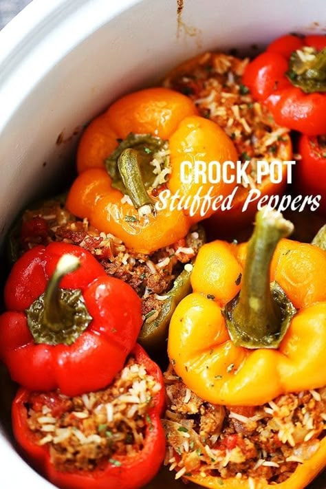 These Crockpot Stuffed Peppers are loaded with spicy pork sausage, rice and tomatoes. It's the perfect easy and hearty meal for any day of the week! #slowcookerrecipe #crockpotrecipe #crockpotstuffedpeppers #slowcookerstuffedpeppers #stuffedpeppersrecipe #easydinneridea #stuffedpeppersincrockpot #healthydinnerrecipe Crockpot Stuffed Peppers, Slow Cooker Stuffed Peppers, Stuffed Peppers Recipe, Bell Pepper Recipes, Paleo Crockpot, Healthy Crockpot, Crockpot Recipes Slow Cooker, Crockpot Meals, Peppers Recipes