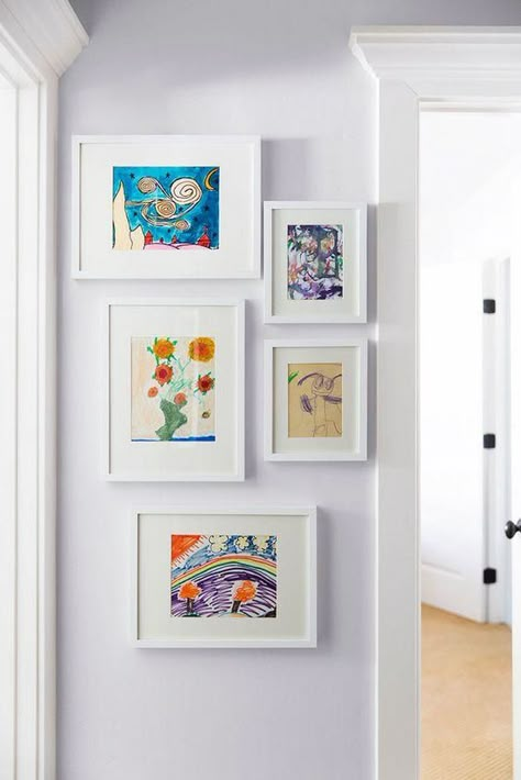 30 Gallery Wall Ideas for Any Kind of Space | Displate Blog Wall Between Two Doors, Hallway Wall Decor Ideas, Hallway Walls, Famous Interior Designers, Gallery Furniture, Hallway Wall Decor, Hallway Wall, Celebrity Homes, Wall Decor Ideas