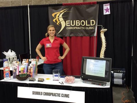 At our booth at the Women's Living Expo in Fort Smith, AR. Chiropractic Booth Ideas, Health Expo Booth Ideas, Health Booth Ideas, Medical Trade Show Booth, Vendor Booth Display, Chiropractic Clinic, Vendor Booth, Fort Smith, Vendor Events