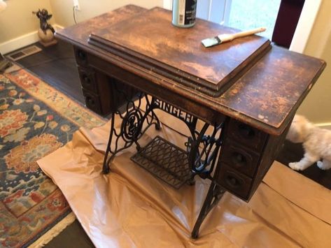 I have had this treadle singer for many years. It dates back to 1902. The top was not in good condition so it needed a makeover. After considering the options I decided to use chalk paint and update it's look. I cleaned the piece thoroughly. I lightly sanded the top where there was damage. TSP does a great job cleaning the surface. That's the beauty of chalk pain. It usually doesn't require much sanding if any at all. And there are very few fumes with this paint. I did my project r… Sewing Machine Makeover, Old Sewing Machine Table, Sewing Machine Ideas, Singer Sewing Machine Table, Singer Machine, Distressing Painted Wood, House Numbers Diy, Sewing Machine Cabinet, Bobs Furniture