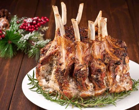 Garlic-Herb Crusted Crown Roast of Pork Recipe - MyGourmetConnection Crown Pork Roast Recipes, Crown Roast Recipe, Crown Roast Of Pork, Crown Roast, Pork Ham, Holiday Menus, Boneless Pork, Roast Recipes, Pork Dishes